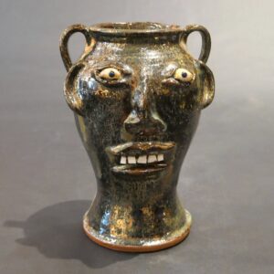 Walter Fleming, Iron Oxide Face Vase, SOLD
